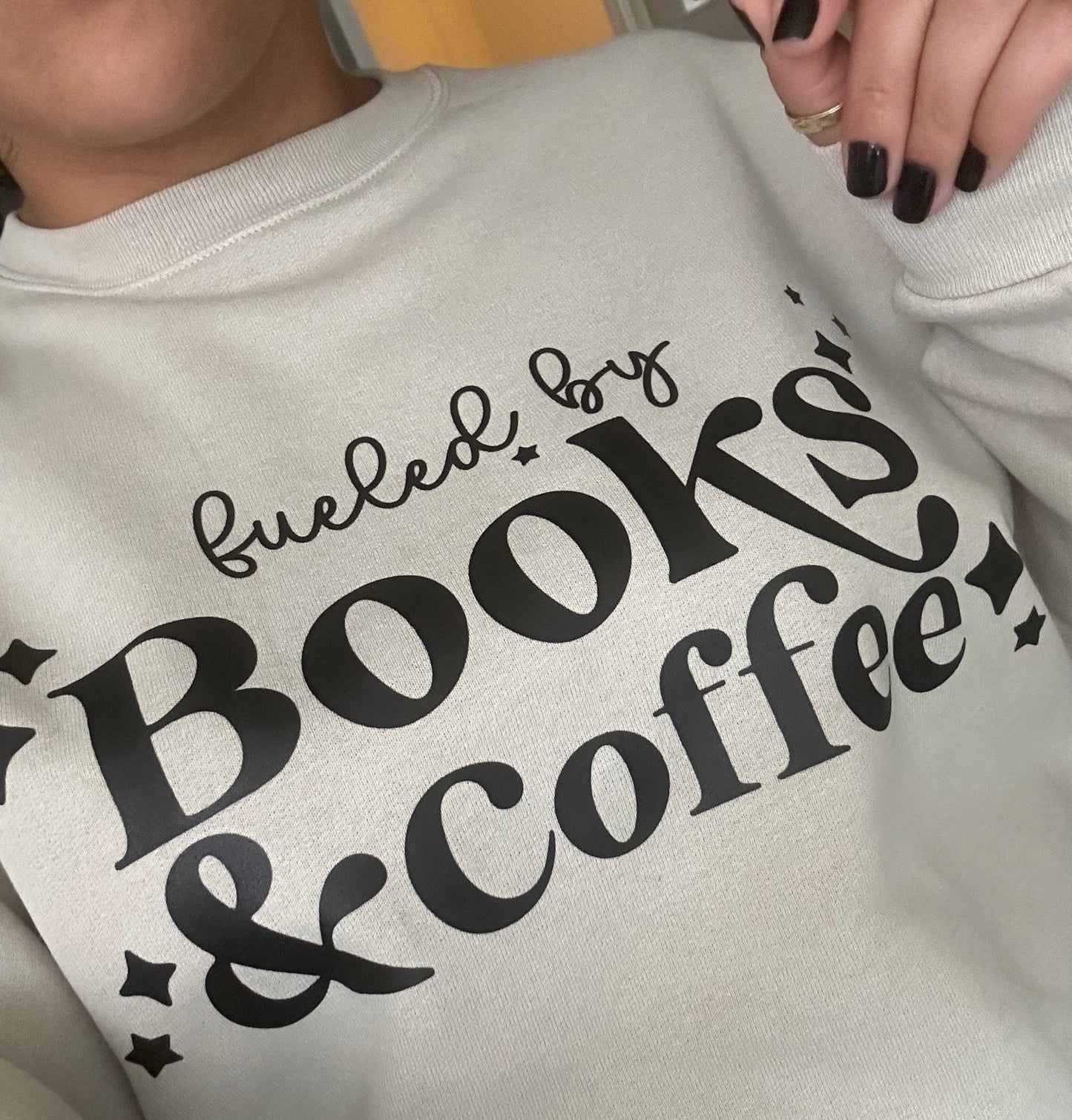 FUELED BY BOOKS & COFFEE crewneck sweatshirt